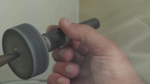 Goldsmith Polishing A Ring With A Buffing Wheel In Jewellery Workshop Stock Footage 342883523