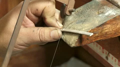 Goldsmith Sawing Metal Stock Footage 12019656