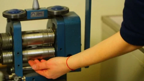 Goldsmith working on his workbench. Production and making manufacturing, factory Stock Footage 120008366