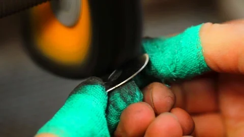 Goldsmith working on his workbench. Production and making manufacturing, factory Stock Footage 120009737