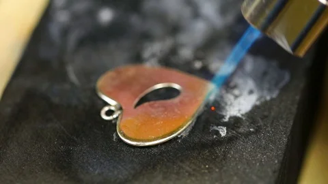 Goldsmith working on his workbench. Production and making manufacturing, factory Stock Footage 120009923
