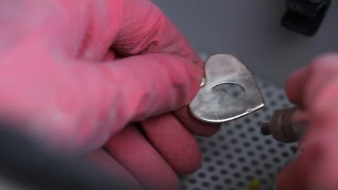 Goldsmith working on his workbench. Production and making manufacturing, factory Stock Footage 120010339