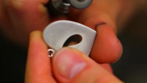 Goldsmith working on his workbench. Production and making manufacturing, factory Stock Footage 120010538