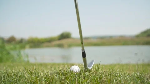 Golf ball and the putter Stock Footage 96011930
