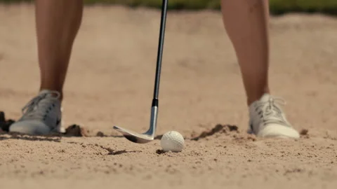 Golf ball in the bunker hit the sand Video stock 220294249