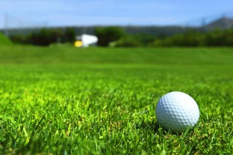 Golf-ball on course Stock Photos