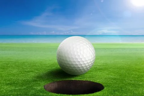 Golf Ball on edge of the hole. Shallow depth of field. Focus on the ball and Stock Illustration