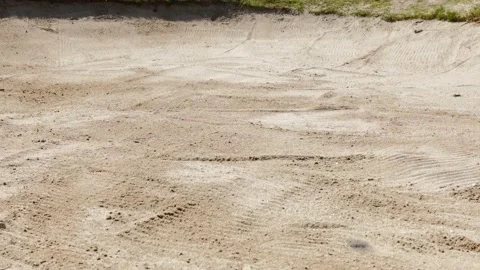 Golf Ball Falling Down in Sand Trap in a Sunny Day 動画素材 191942169