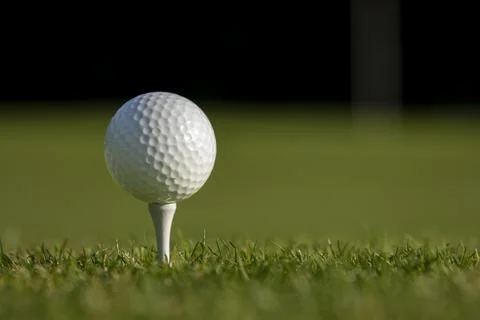 Golf ball on the golf course Stock Photos