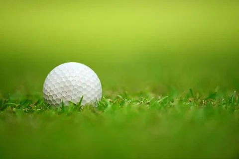 Golf ball on grass Stock Photos