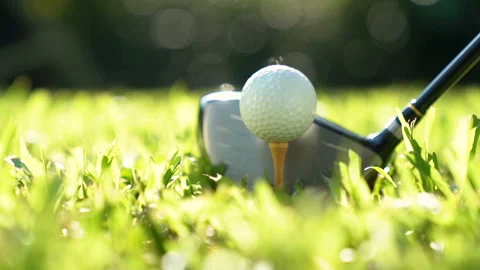 Golf ball on green grass ready to be struck Stock Footage 132859124