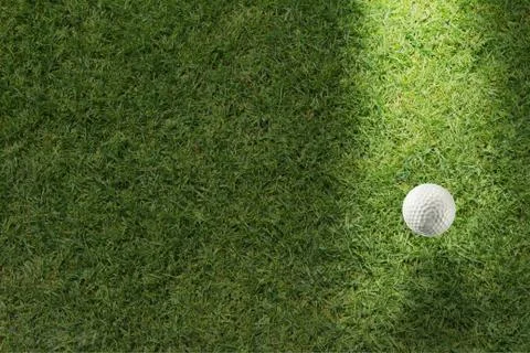 Golf ball on green Stock Illustration