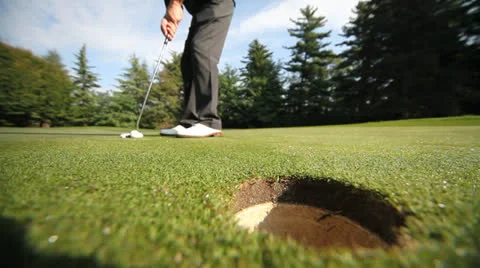 Golf. Ball in the hole Stock Footage 23398486