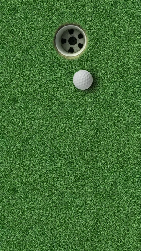 Golf ball in hole on green grass putting surface sports background Stock Footage 330119972
