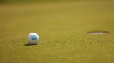 Golf ball on putting green Video stock 27798765