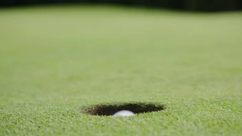 Golf ball rolling into hole in Slow Motion 스톡 동영상 153698392