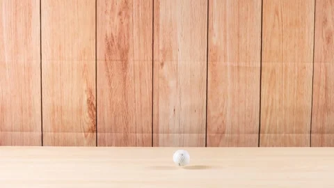 Golf Ball Rolling on Wooden Surface Stock Footage 303891625