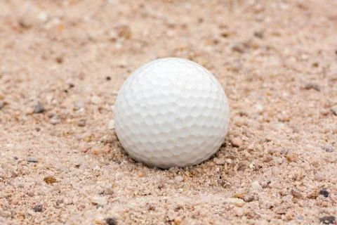 Golf Ball in Sand Stock Photos