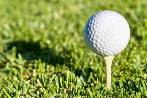 Golf ball shadow Stock Photos