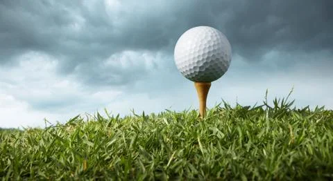 Golf ball on tee Stock Photos