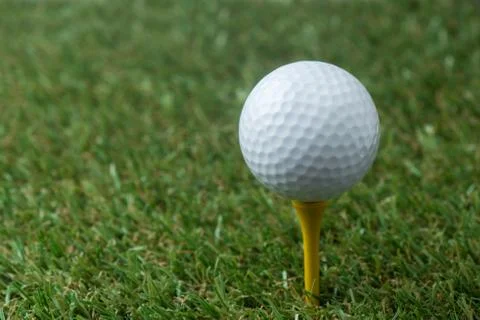 Golf ball on tee Stock Photos
