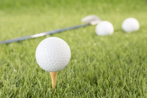 Golf ball on tee Stock Photos