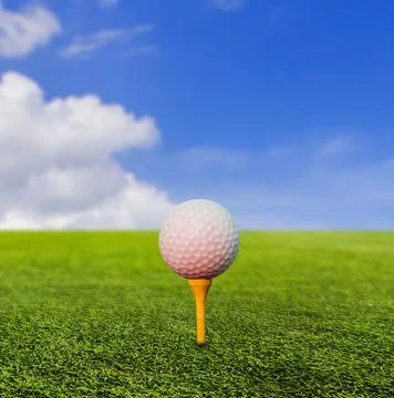 Golf ball on tee Stock Photos
