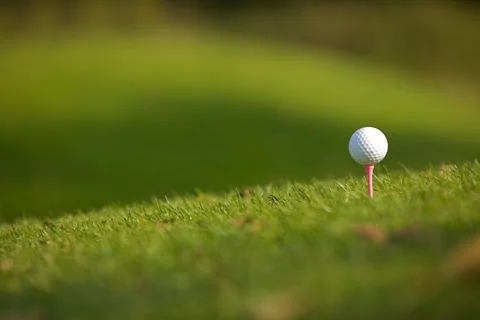 Golf ball on tee Stock Photos