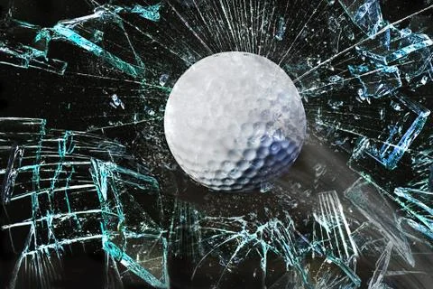 Golf ball through window. Stock Photos