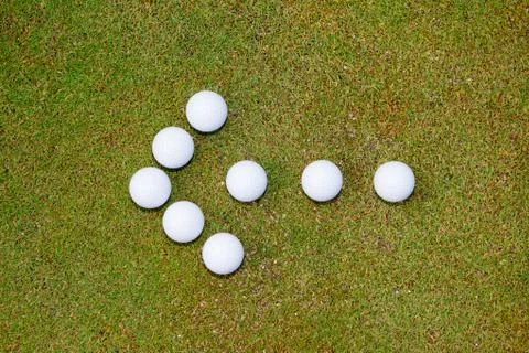 Golf balls arrow Stock Photos
