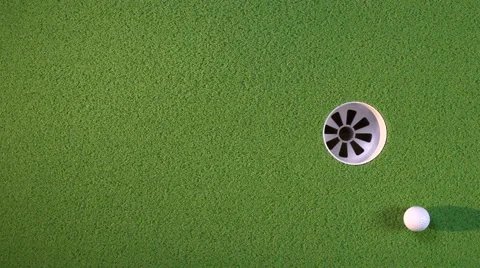 Golf balls curl into cup Video stock 1119283