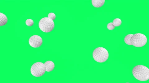 Golf balls falling on green screen Stock Footage
