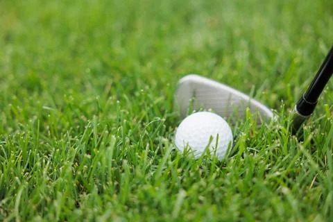 Golf balls on the golf course with golf clubs ready for golf in the first sho Stock Photos