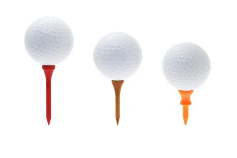 Golf balls on tees Stock Photos