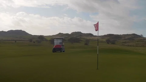 Golf Buggy/Cart next to green Stock Footage 104563232