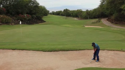 Golf bunker hole in one shot in Hawaii Stock-Footage 48554155