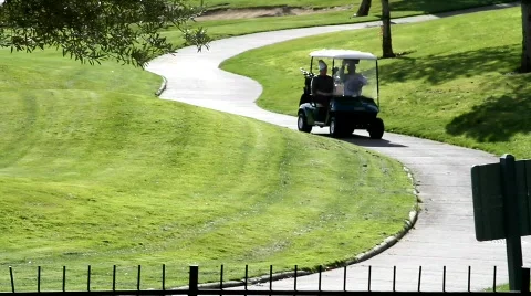 Golf Cart Drive by Stock Footage 671324