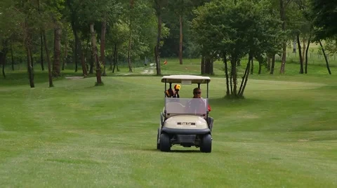 Golf cart driving along the course 012 Stock Footage 44613076