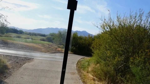 Golf cart driving POV Stock Footage 76402146