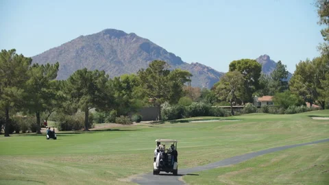 Golf Carts Driving on Course Stock Footage 137282441