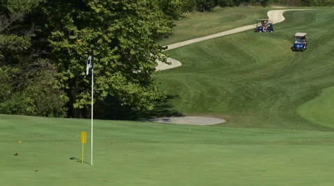Golf carts on green Stock Footage 55385205