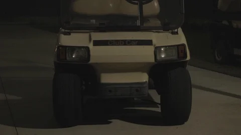 Golf Carts Parked in Heavy Rain at Night Stock Footage 114019019