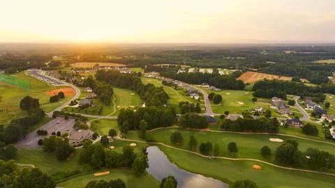 Golf Course From Above at Sunset Stock Photos