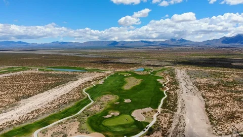 Golf Course Aerial High Toward Mountains Stock Footage 112896468