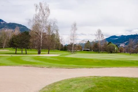 Golf course in Alps Stock Photos