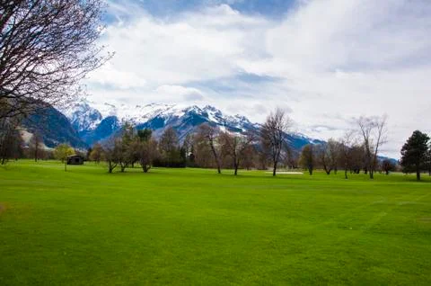 Golf course in Alps Stock Photos