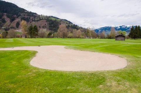 Golf course in Alps Stock Photos