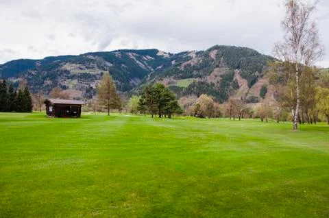 Golf course in Alps Stock Photos