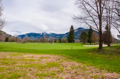 Golf course in Alps Stock Photos