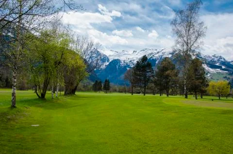 Golf course in Alps Stock Photos